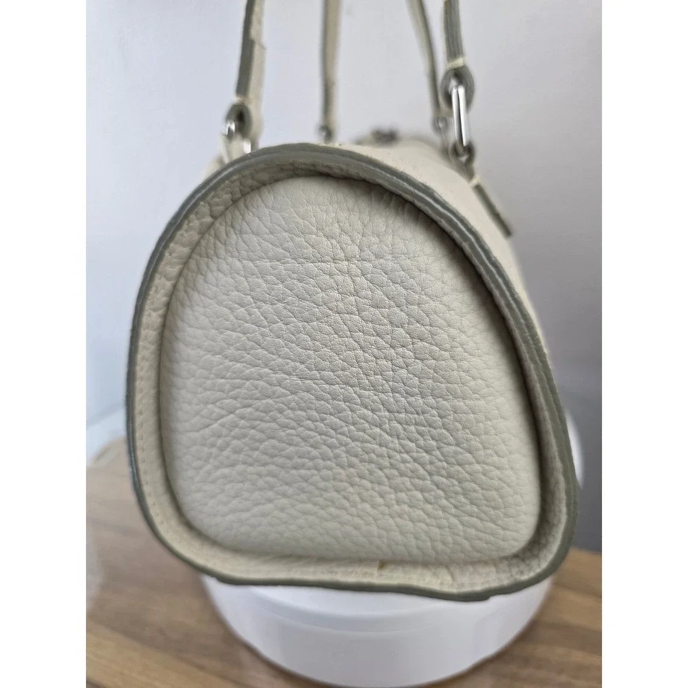 Dooney & Bourke Cream Pebbled Leather Barrel Shoulder Bag Marbled Lining
